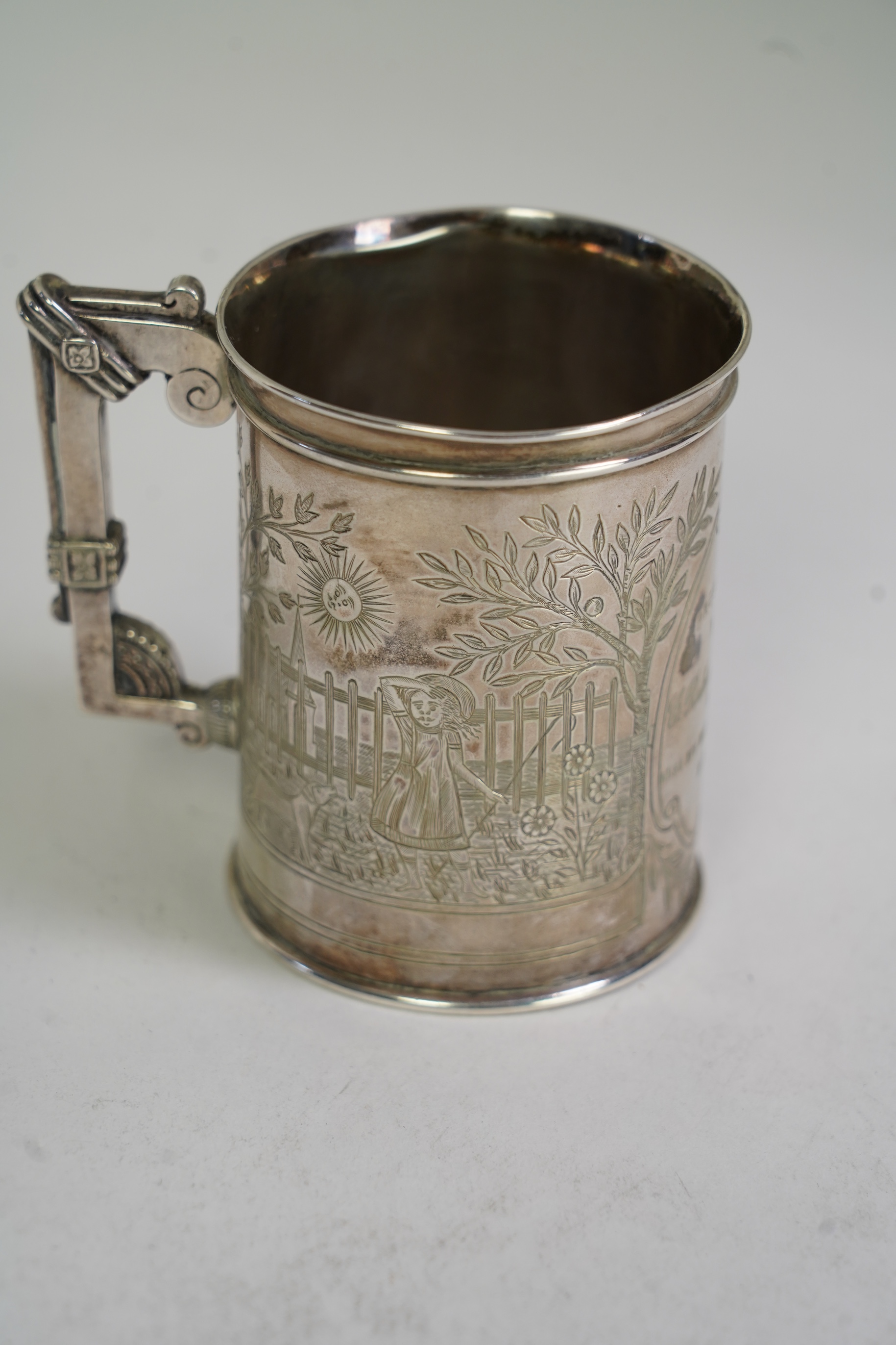 A 19th century Indian colonial white metal christening mug, by P. Orr & Sons, Madras